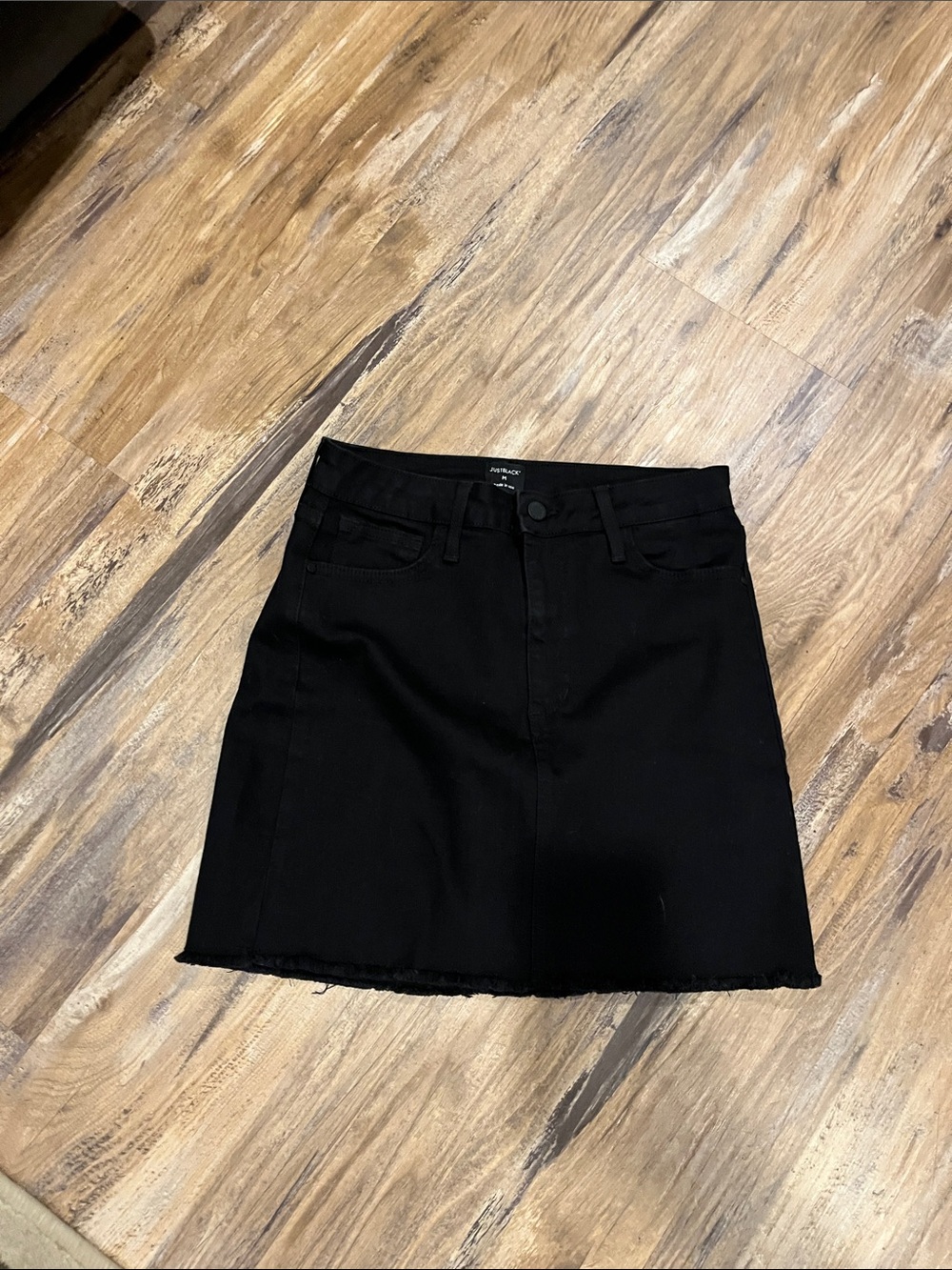 Just Black Solid Black Denim Mini Skirt with Raw Hem